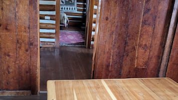 Ft. Wilderness Cabin (Pet Friendly) | Living area | 32-inch TV with satellite channels