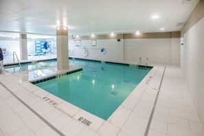 Indoor pool, open 9:00 AM to 11:00 PM, pool loungers