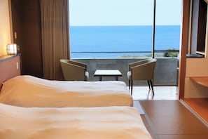 Japanese Western Twin Room (2 Beds + 1 Japanese Futon), Ocean View | Premium bedding, down duvets, in-room safe, individually decorated