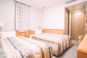 Standard tvåbäddsrum - icke-rökare | Mörkläggningsgardiner, strykjärn/strykbräda, gratis wi-fi och sängkläder