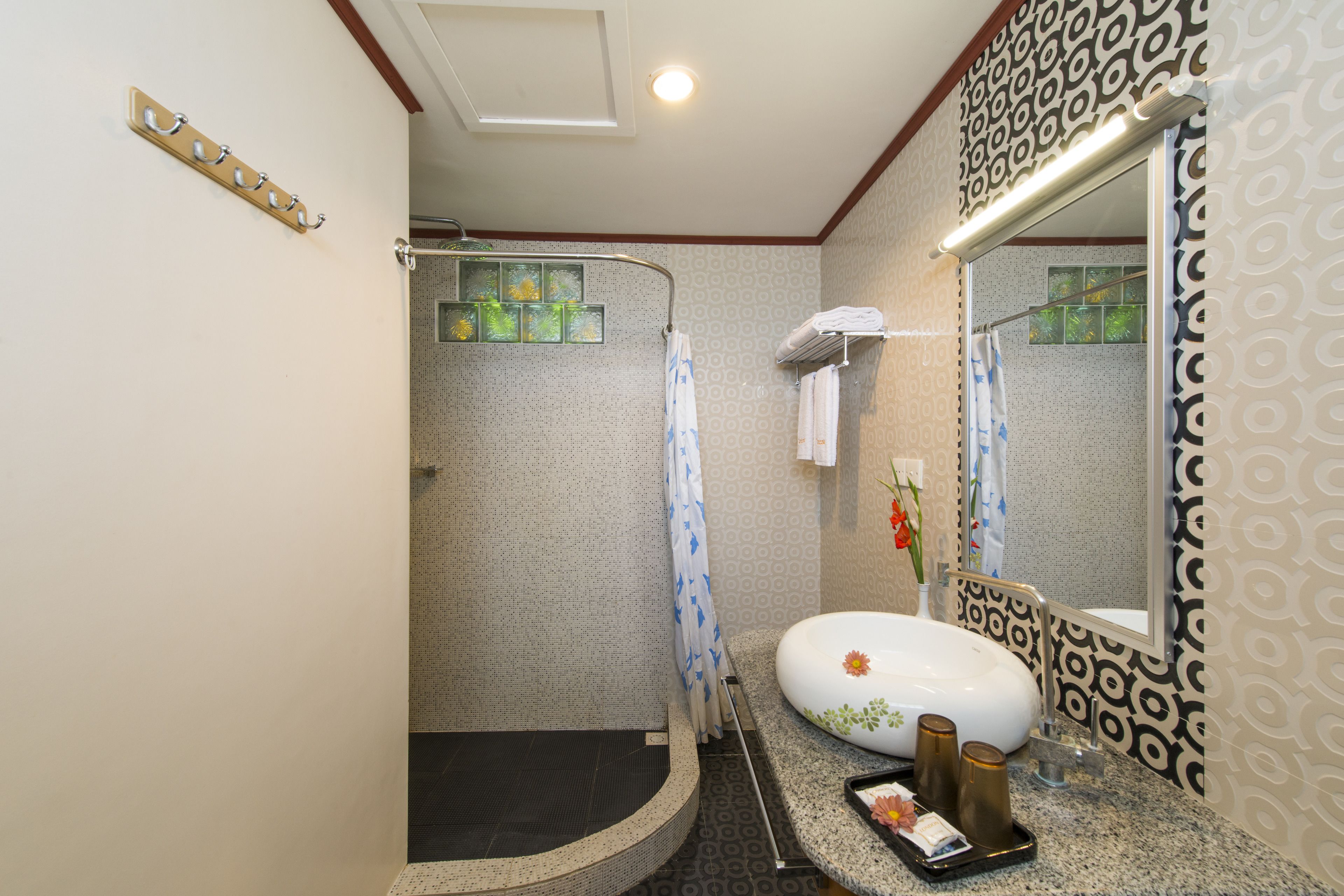 superior room | bathroom | shower, free toiletries, hair dryer, slippers