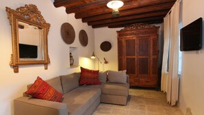 Cottage | Living room | TV, fireplace, video-game console, DVD player - Kalopanayiotis Cottage (Kalopanayiotis)