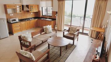 Suite Comfort, vista città | Angolo cottura privato | Macchina per tè/caffè