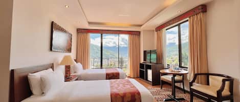 Chambre exécutive, balcon, vue sur la ville | Literie de qualité, minibar, coffre-fort pour ordinateur portable