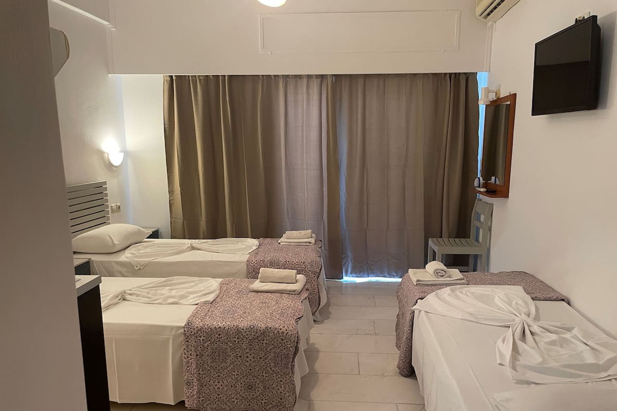 Studio, 3 lits une place | 1 chambre, Wi-Fi gratuit, draps fournis