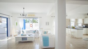 Villa, 4 Bedrooms | Living area | Flat-screen TV, fireplace, DVD player - Protaras Seafront Villa Mimosa (Paralimni)