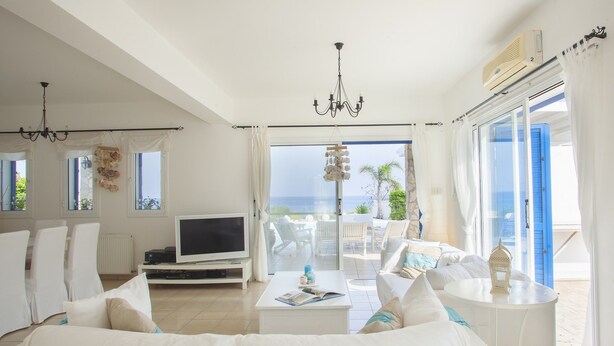 Villa, 4 Bedrooms | Living room | Flat-screen TV, fireplace, DVD player - Protaras Seafront Villa Mimosa (Paralimni)