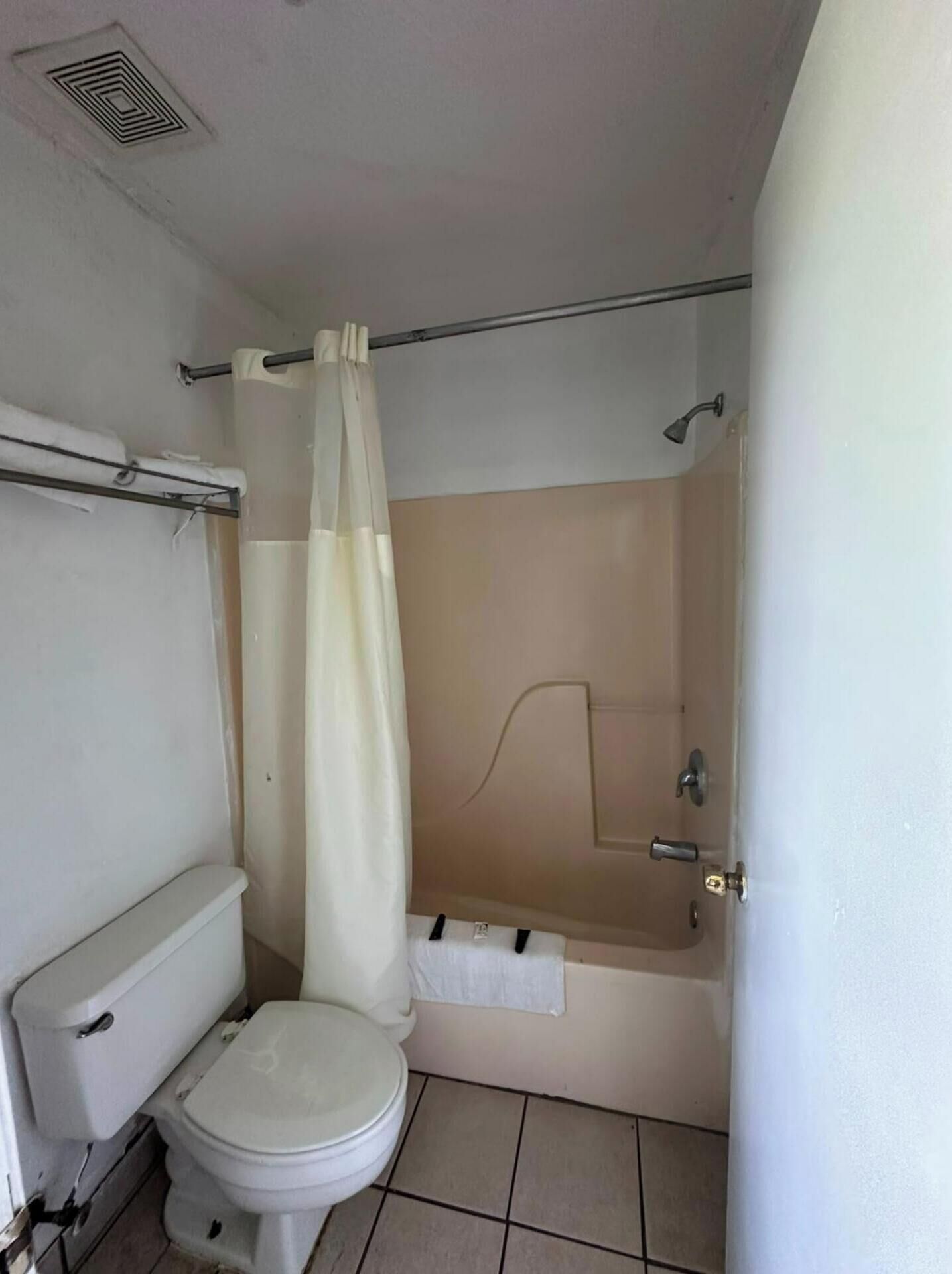 Room, 2 Double Beds, Smoking | Bathroom | Free toiletries, hair dryer, towels