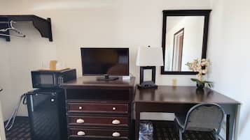 Quarto standard, 1 cama Queen | Cortinas blackout, Wi-Fi de cortesia, roupa de cama