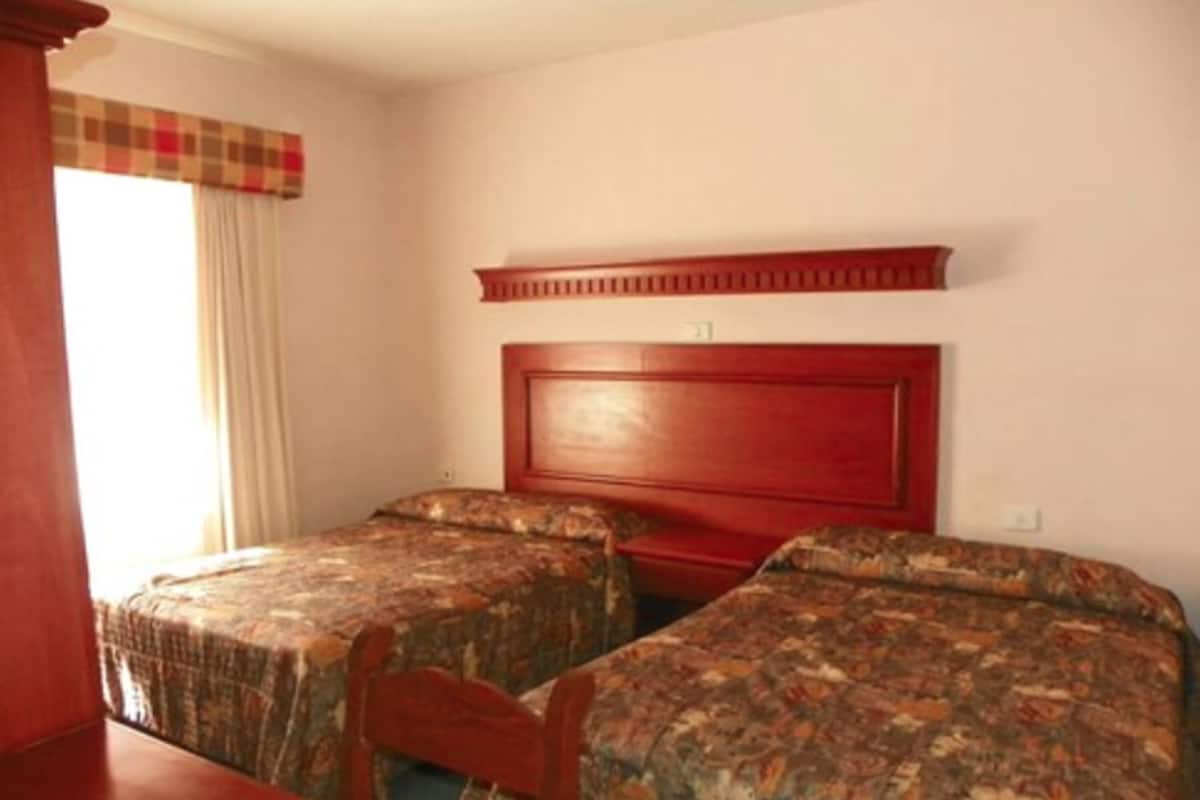 Suite Deluxe, 2 camas dobles | Tabla de planchar con plancha y wifi gratis
