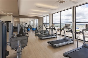 Work out with a city view at this well-maintained gym featuring treadmills, ellipticals, and weightlifting stations.