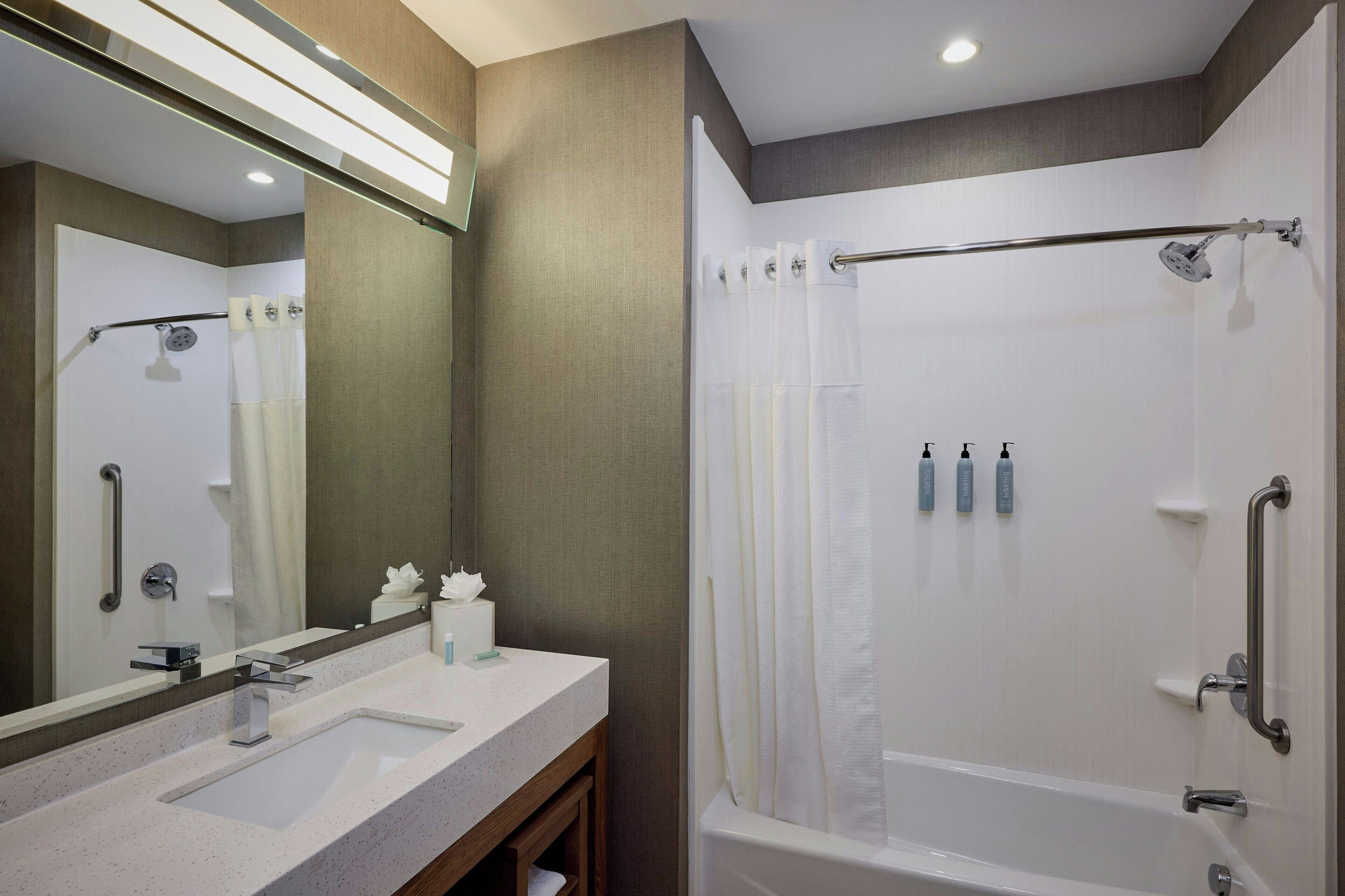 room, 2 queen beds | bathroom | combined shower/bathtub, free toiletries, hair dryer, towels