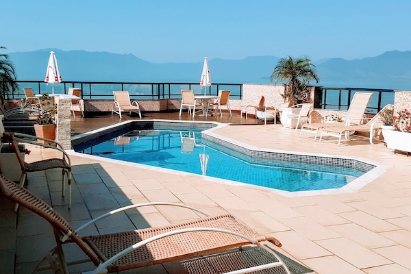 Outdoor pool, open 8:30 AM to 9:30 PM, pool umbrellas, sun loungers