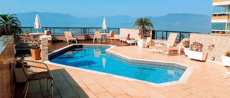 Outdoor pool, open 8:30 AM to 9:30 PM, pool umbrellas, sun loungers