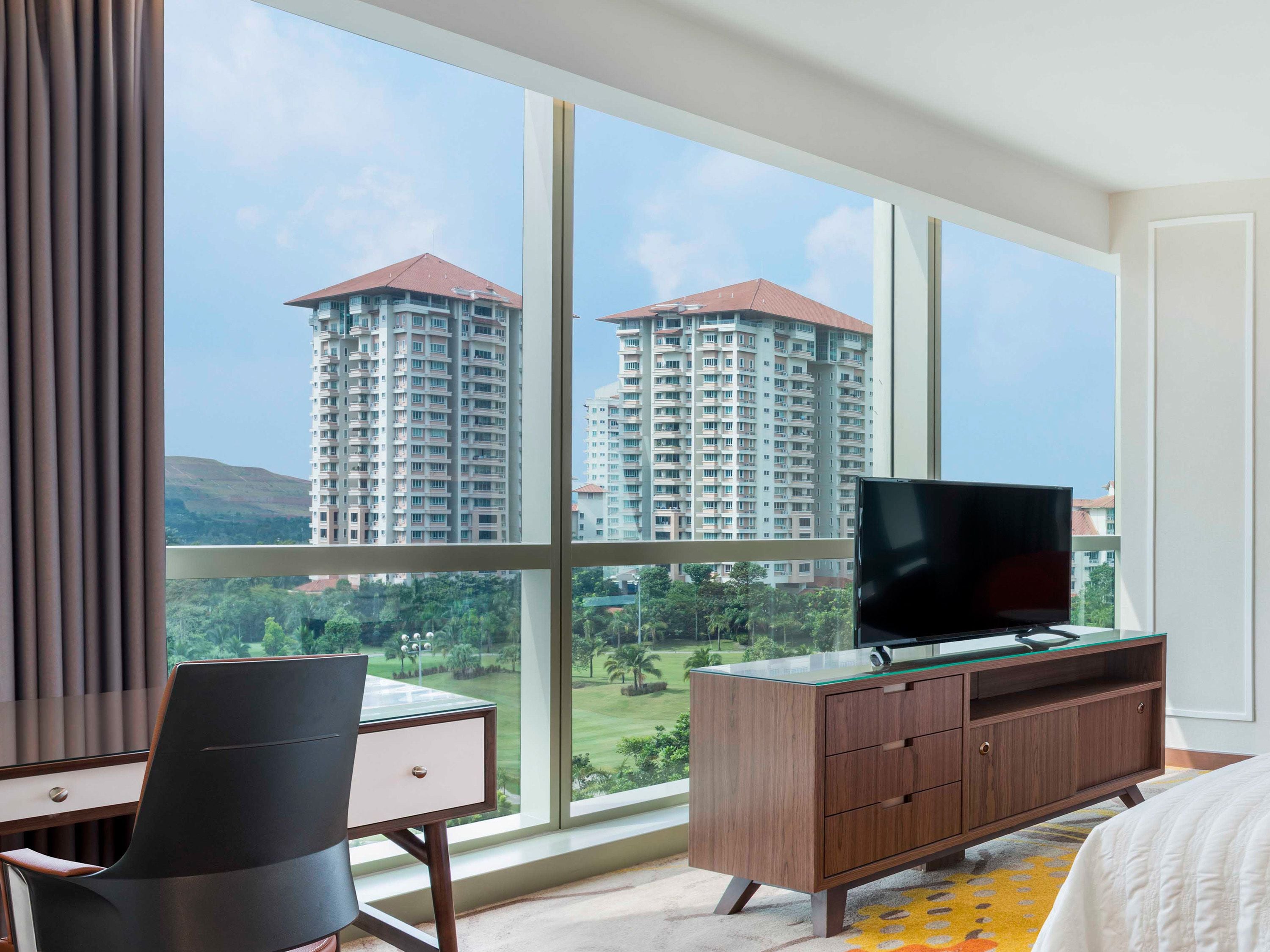 large suite,1 king bed, club lounge access | in-room safe, desk, iron/ironing board, free cots/infant beds