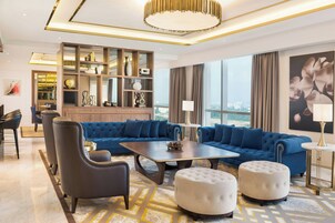 Presidential Suite, 1 Double Bed | Living room | 55-inch LED TV with cable channels, TV