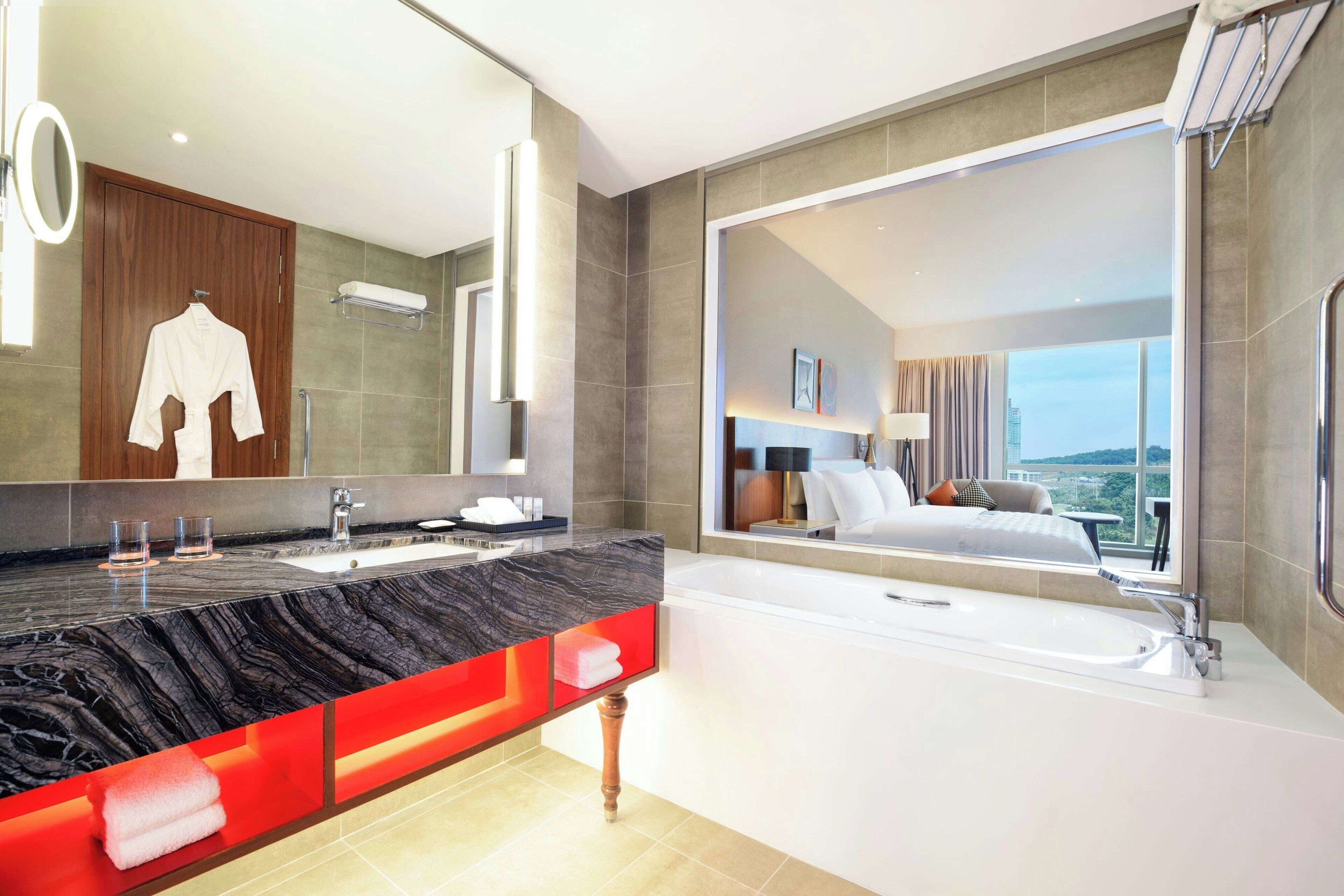 separate bathtub and shower, free toiletries, hair dryer, bathrobes