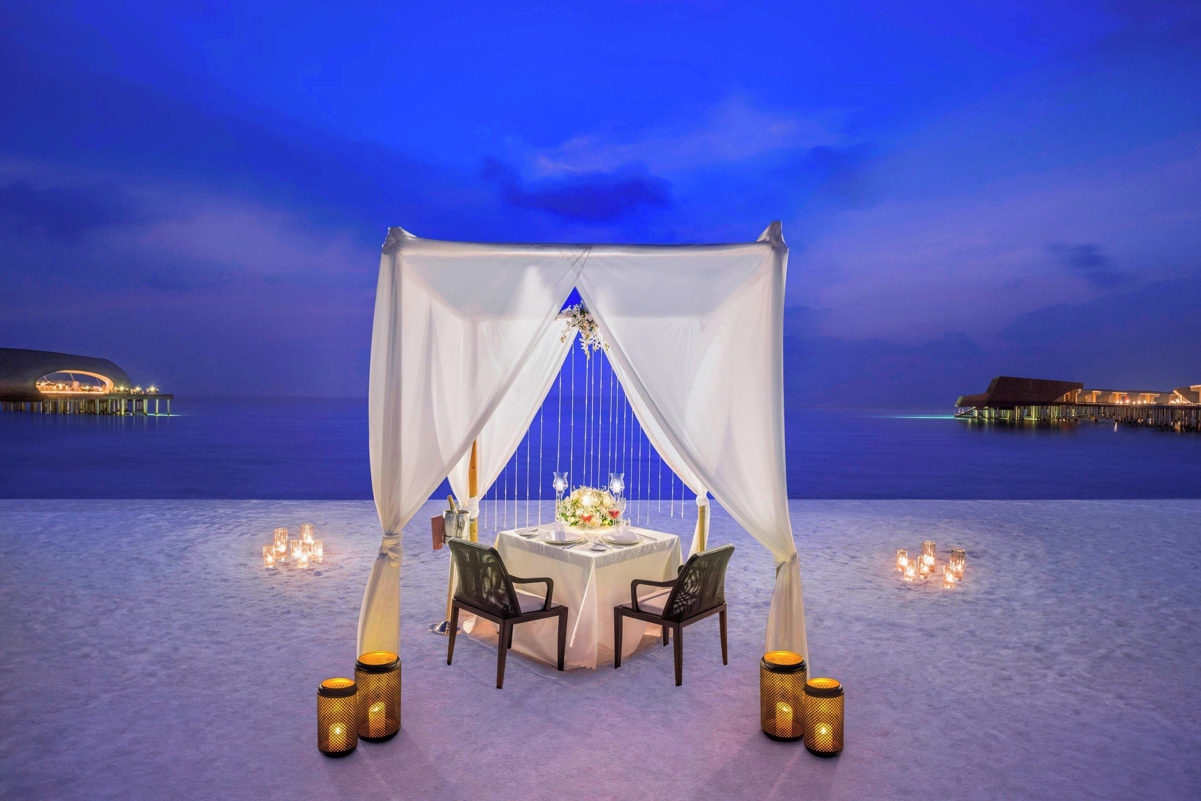 on the beach, white sand, sun-loungers, beach umbrellas