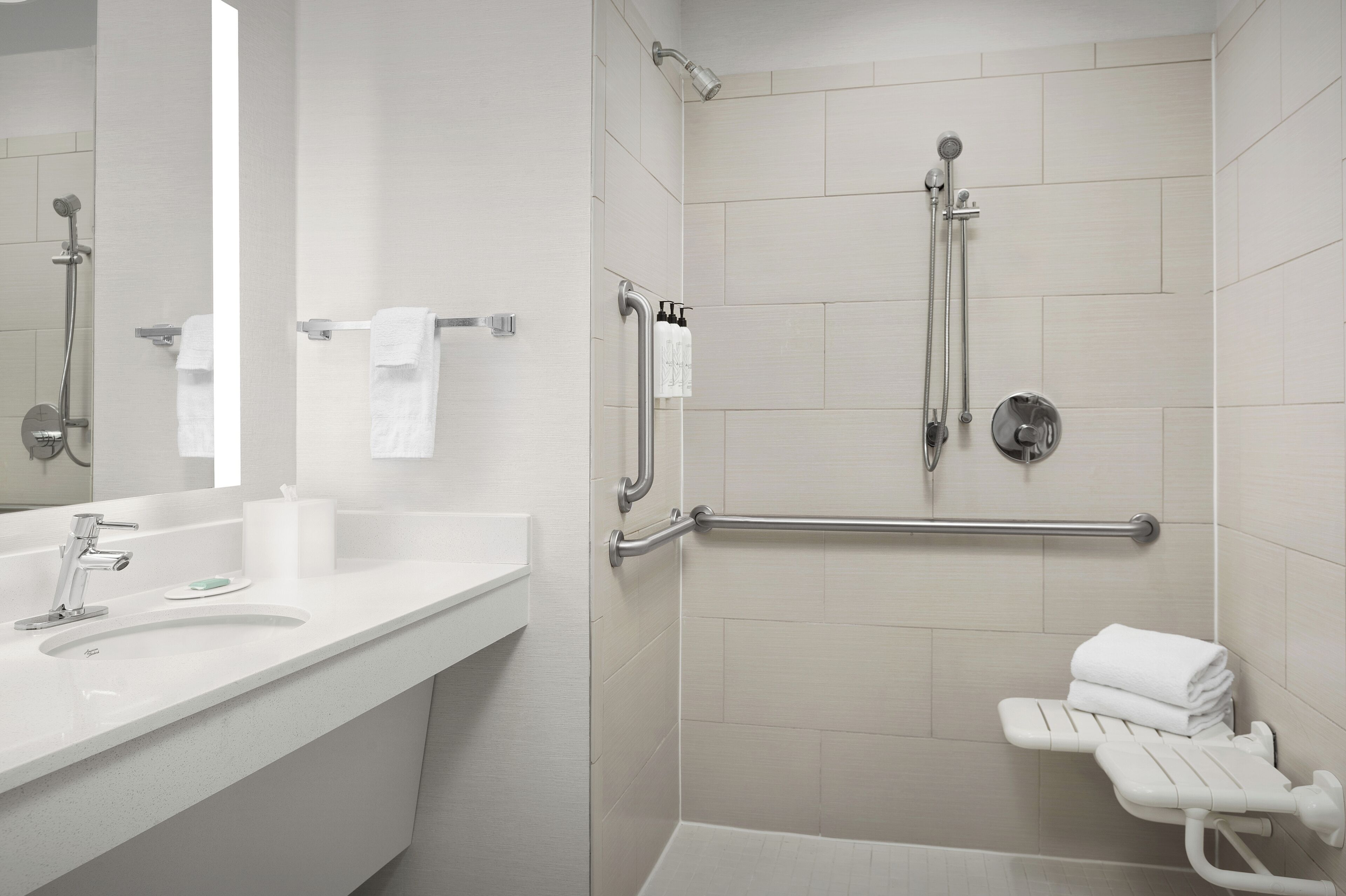 studio, 1 king bed with sofa bed, non smoking (mobility/hearing access, roll-in shwr) | bathroom | designer toiletries, hair dryer, towels