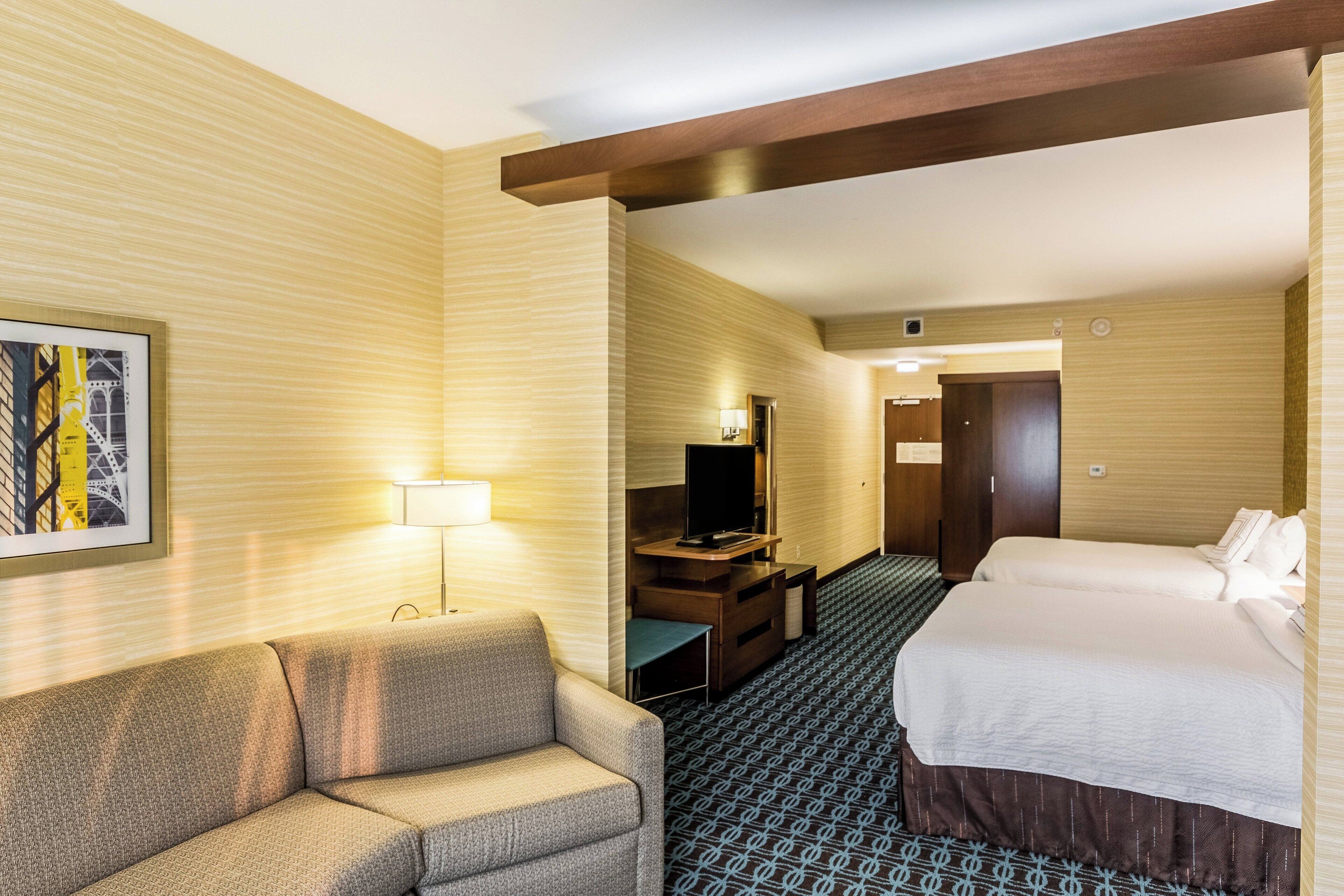 suite, multiple beds | in-room safe, desk, blackout curtains, iron/ironing board