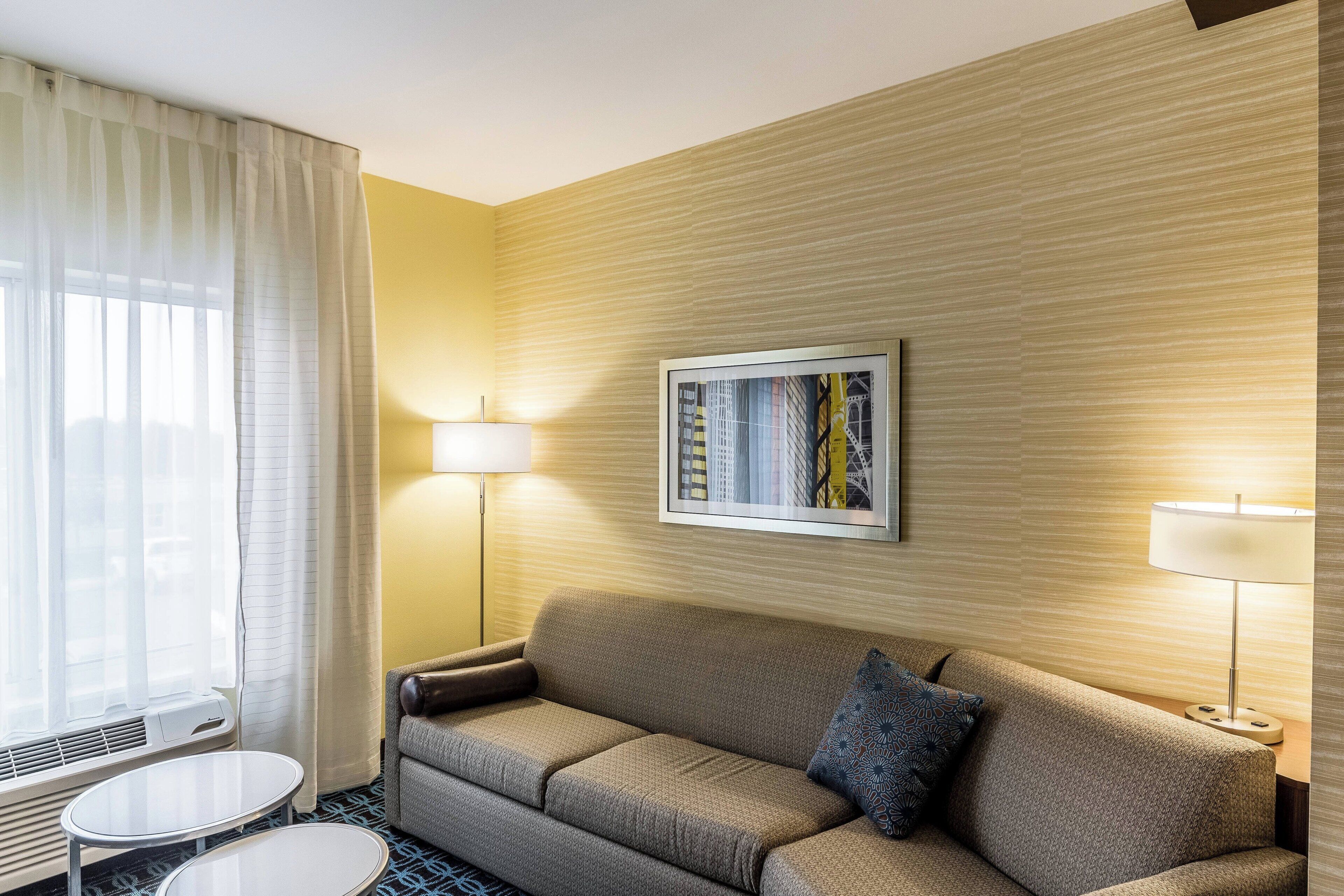 suite, 1 king bed with sofa bed | living area | 32-inch smart tv with premium tv channels, tv, netflix