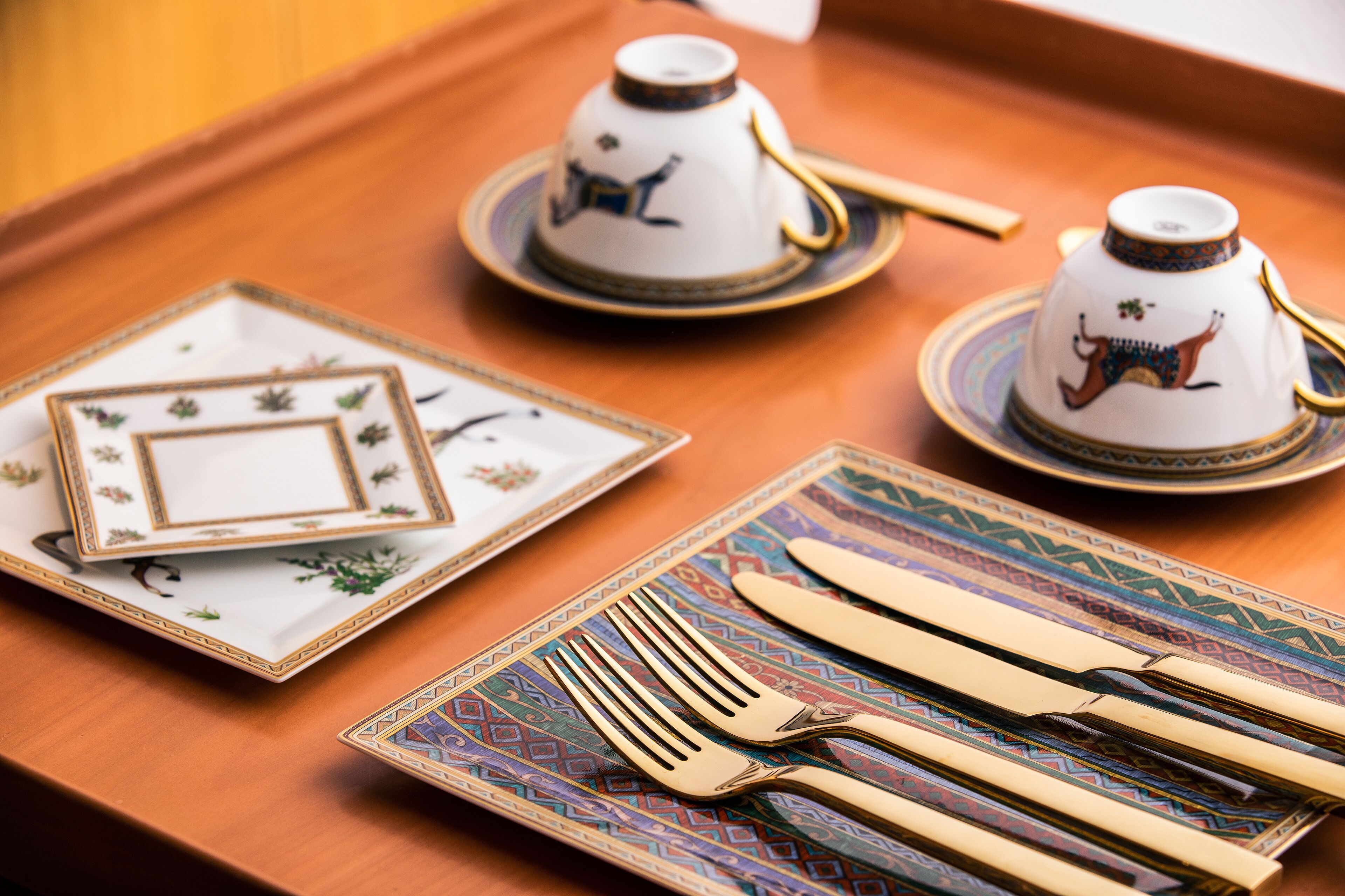 A tray with a teapot, teacups, a teacandle, a teacup, a teapot, a teacup, a teacup, a teacup, a teacup, a teacup, a teacup, a teacup, a teacup, a teacup, a teacup, a teacup, a teacup, a teacup, a teacup, a teacup, a teacup, a teacup, a teacup, a teacup, a teacup, a teacup, a teacup, a teacup, a teacup, a teacup, a teacup, a teacup, a teacup, a teacup, a teacup, a teacup, a teacup, a teacup, a teacup, a te