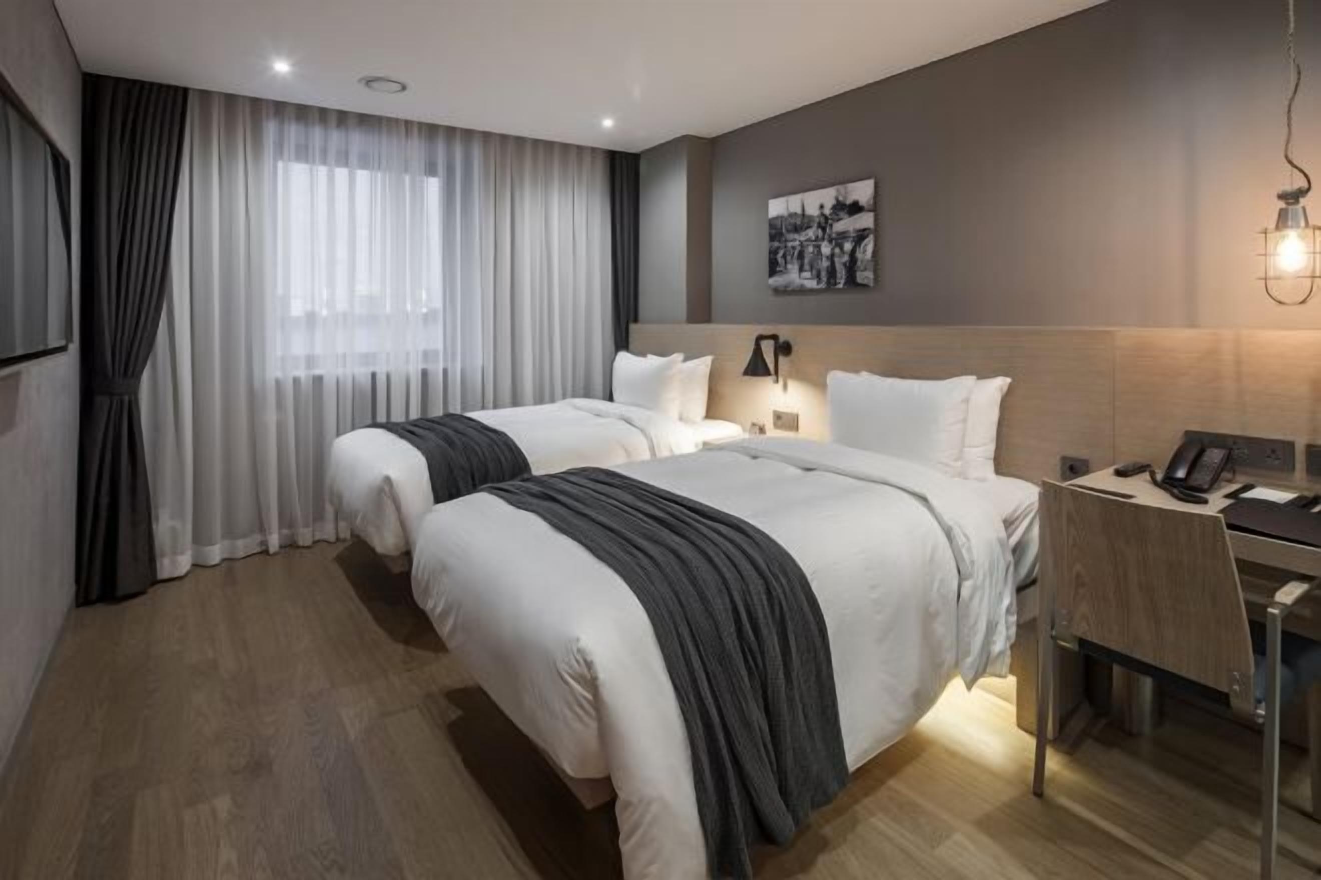 Free minibar, in-room safe, laptop workspace, blackout drapes