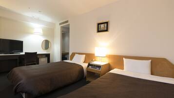 Habitación con 2 camas individuales, para fumadores (Extra Bed) | Escritorio, cortinas blackout y wifi gratis