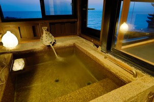 Free toiletries, hair dryer, slippers, electronic bidet