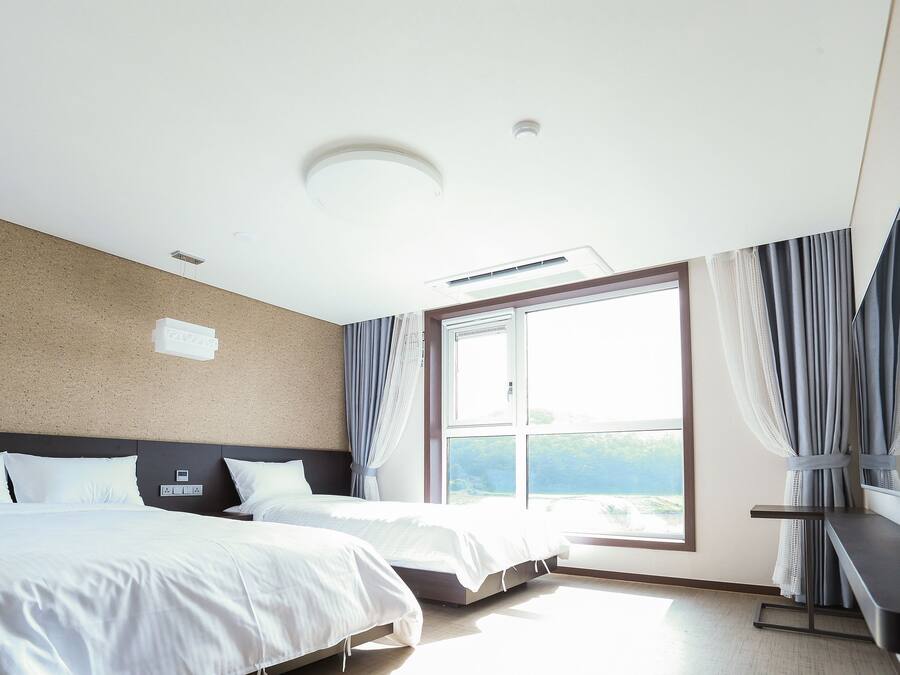 Quarto duplo premium | Frigobar, cortinas blackout, quartos à prova de som, Wi-Fi de cortesia