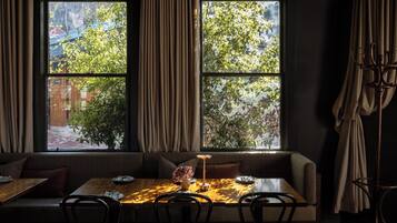 Breakfast, lunch, dinner served; garden views