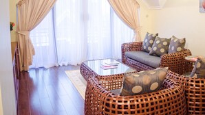 Luxury Penthouse | Living room | Flat-screen TV - Gramo Suites (Nairobi)