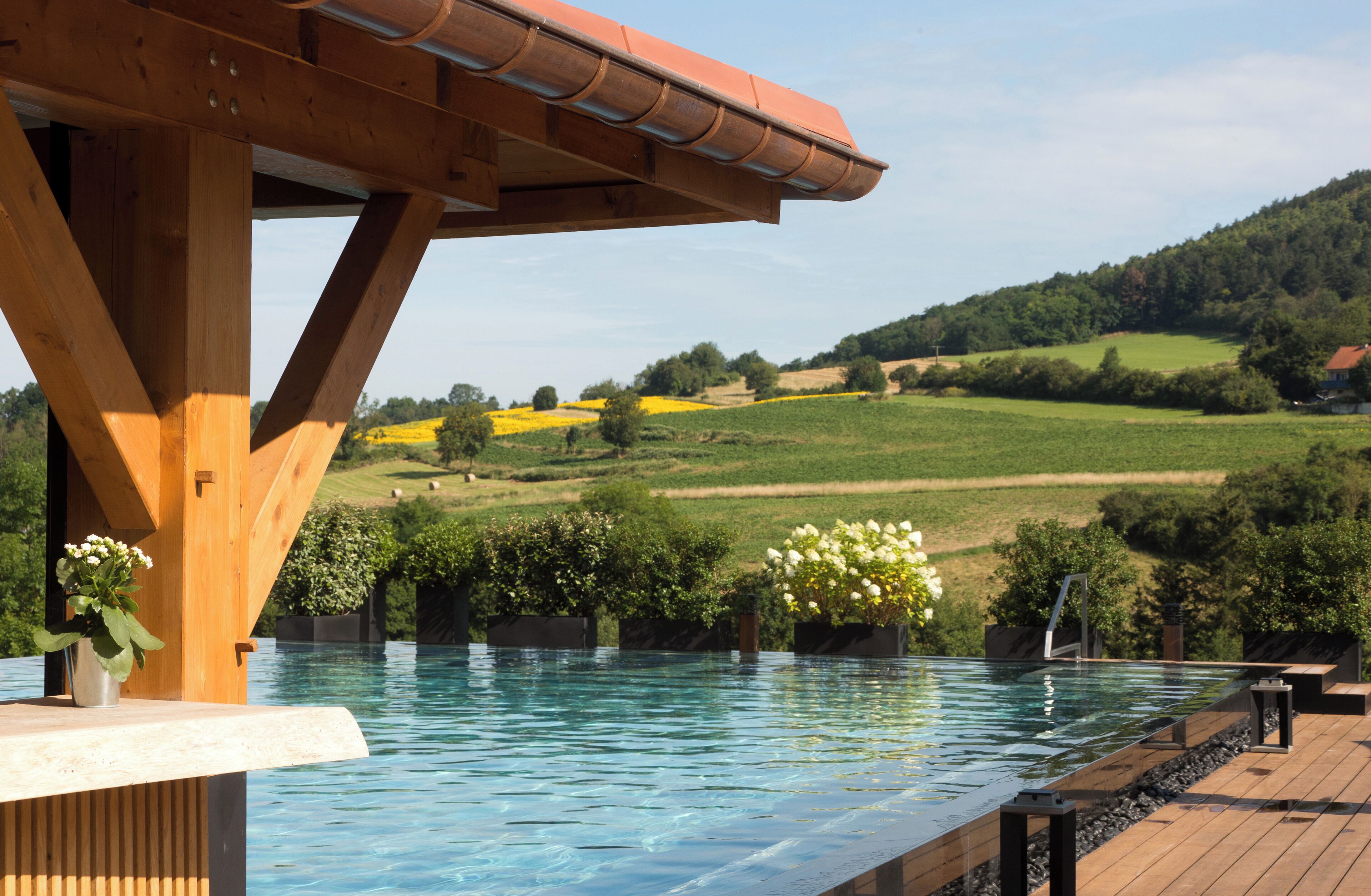 Indoor pool, seasonal outdoor pool, pool umbrellas, sun loungers