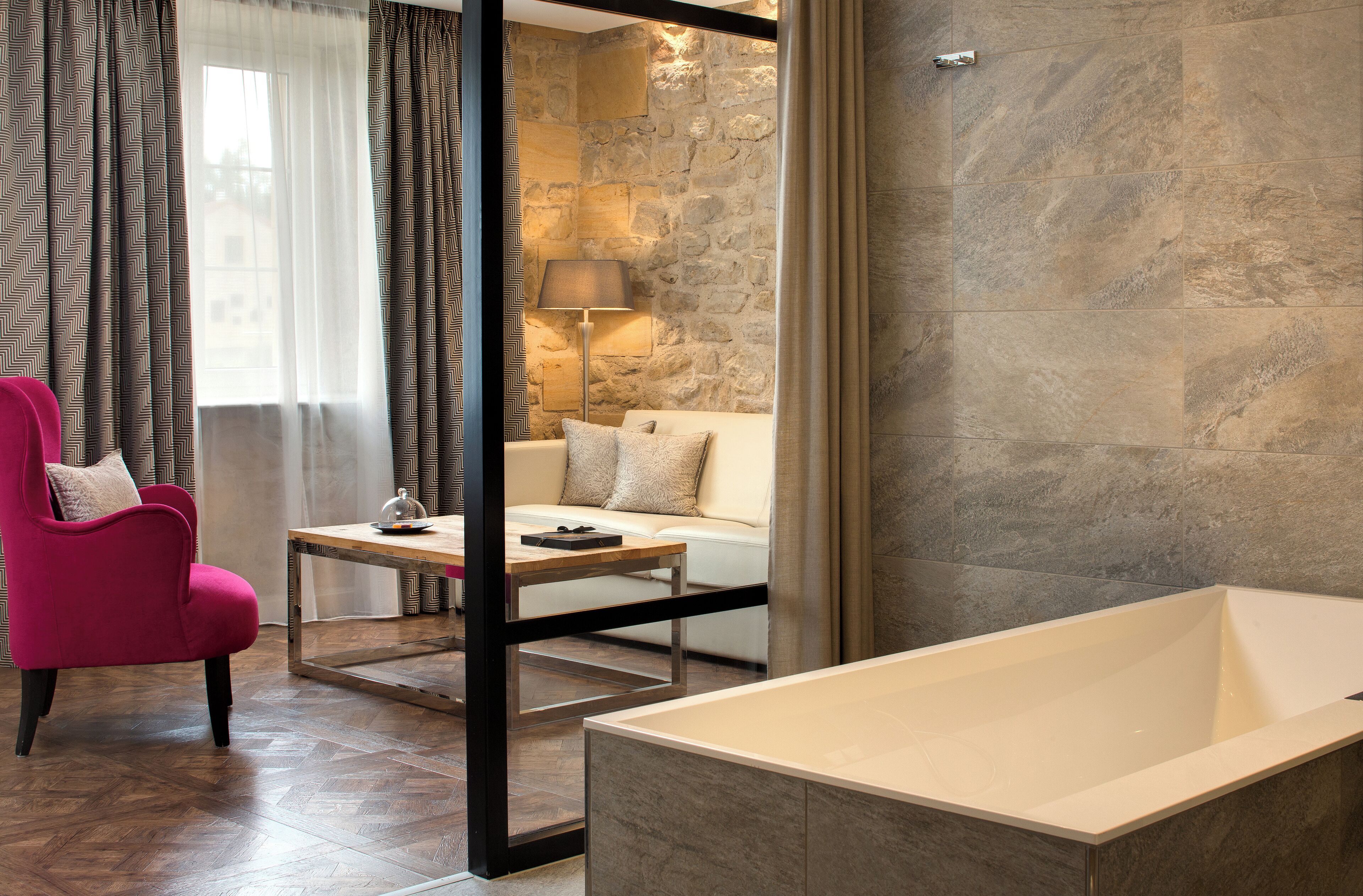 junior suite, 1 king bed with sofa bed, non smoking | bathroom | designer toiletries, hair dryer, bathrobes, slippers