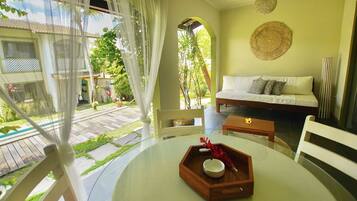 Standard Room | Living area | 32-inch LED TV with satellite channels, TV