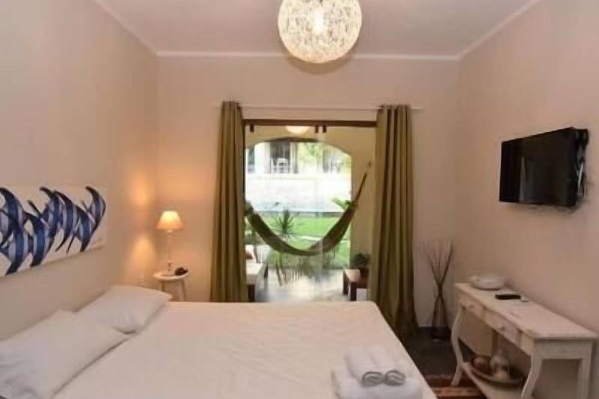 Desk, blackout curtains, free cots/infant beds, free WiFi