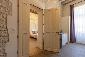 Luxury Suite, 2 Bedrooms | Living area | Flat-screen TV