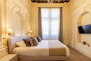 Suite de lujo, 2 habitaciones | Ropa de cama de alta calidad y minibar 