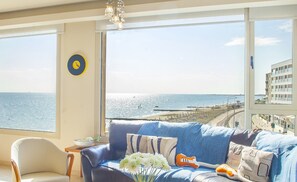 Appartement, 3 chambres | Coin séjour | Télévisions à écran plasma