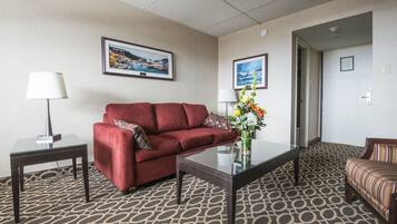 Suite, 1 King Bed with Sofa bed | Living area | 42-inch flat-screen TV with cable channels, TV