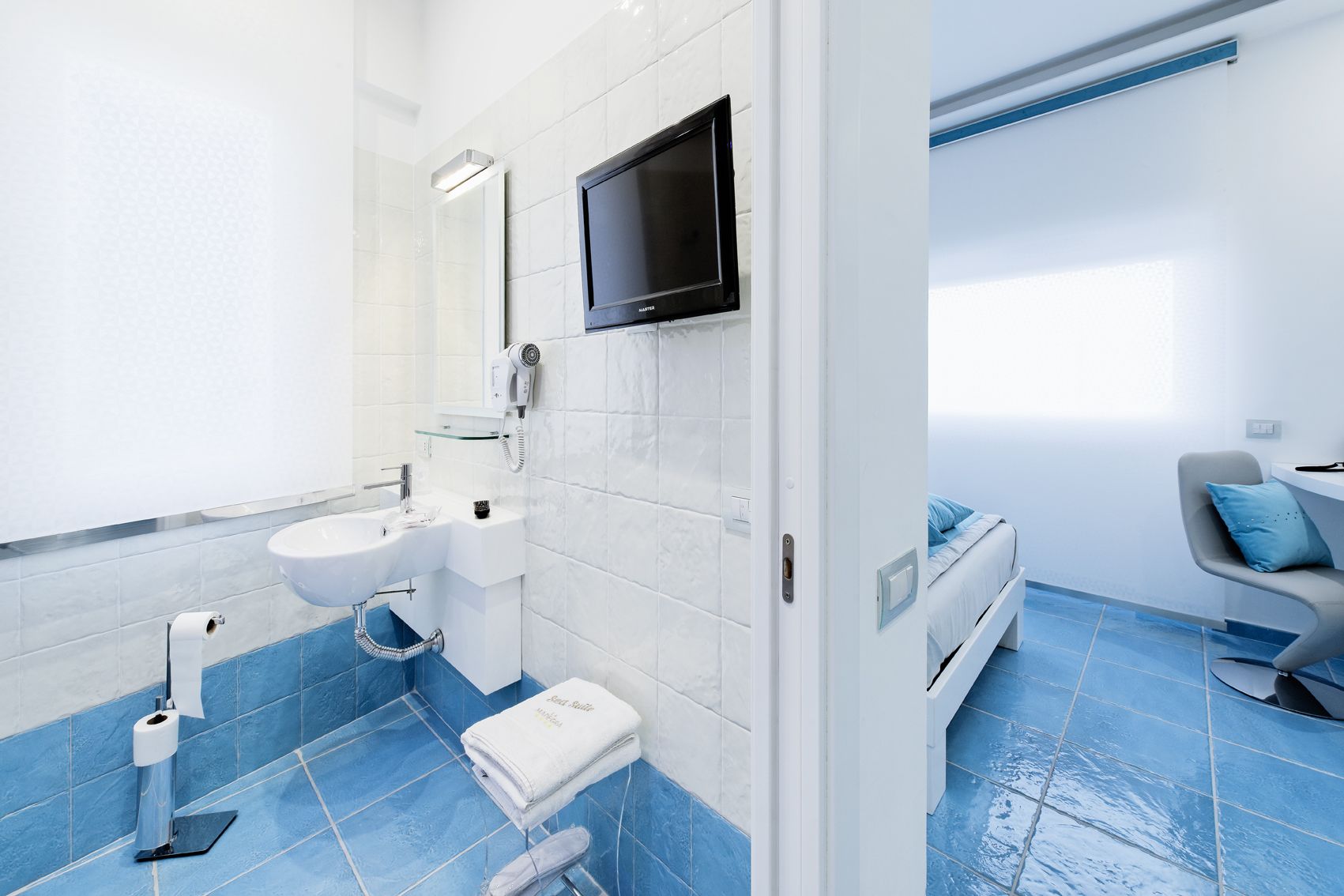 Shower, free toiletries, hair dryer, slippers