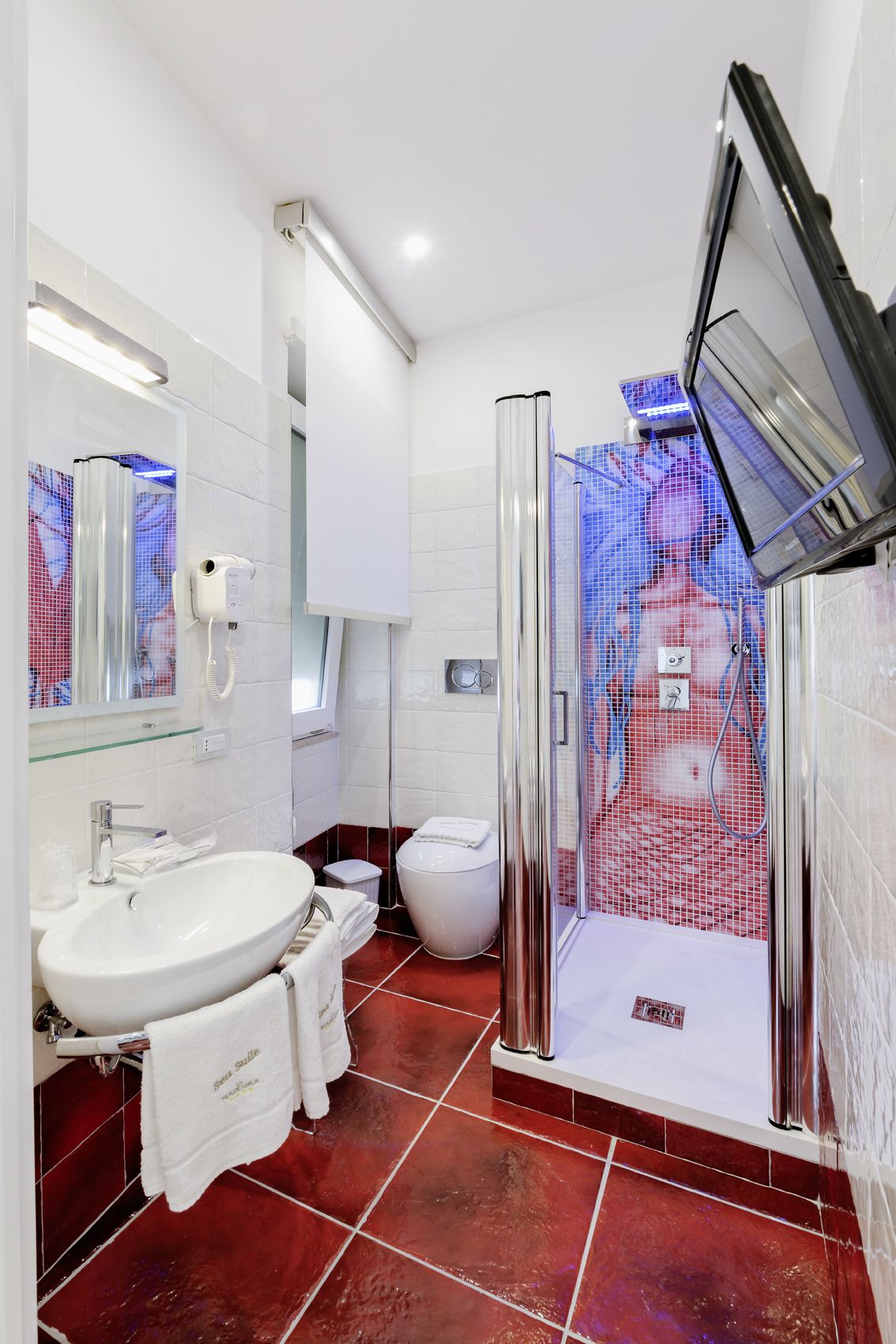 Shower, free toiletries, hair dryer, slippers