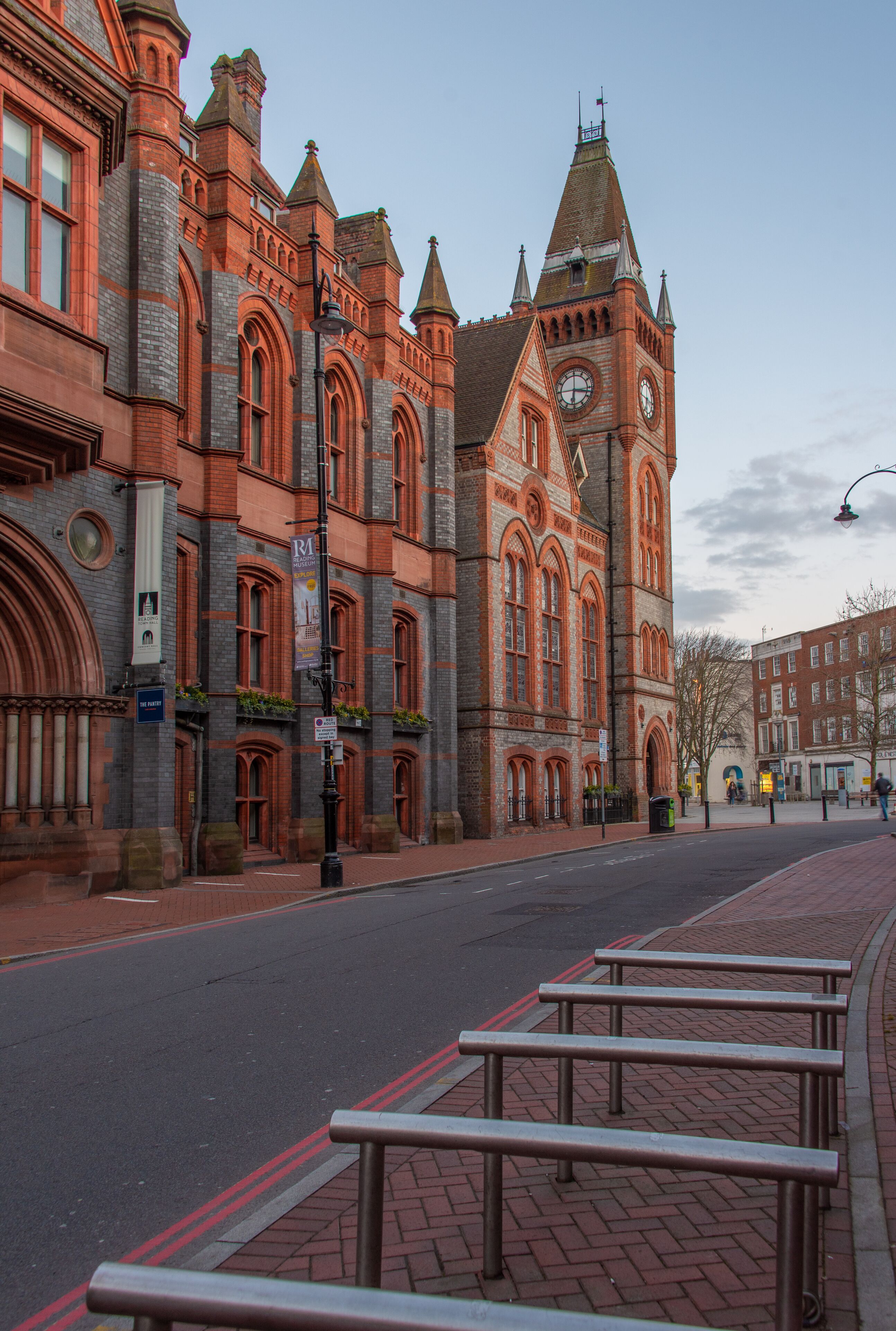 A historic building with arched windows and a clock tower.