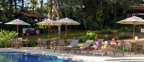 Indoor pool, outdoor pool, pool umbrellas, sun loungers