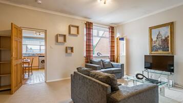 Business Apartment, Private Bathroom, City View (3 Bedrooms) | Living area | Flat-screen TV