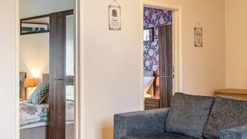 Business Apartment, Private Bathroom, City View (3 Bedrooms) | Living area | Flat-screen TV