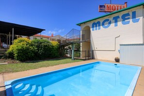 Outdoor pool, open 7:00 AM to 9:00 PM, sun loungers