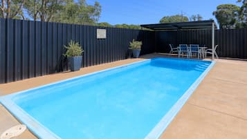 Outdoor pool, open 7:00 AM to 9:00 PM, sun loungers
