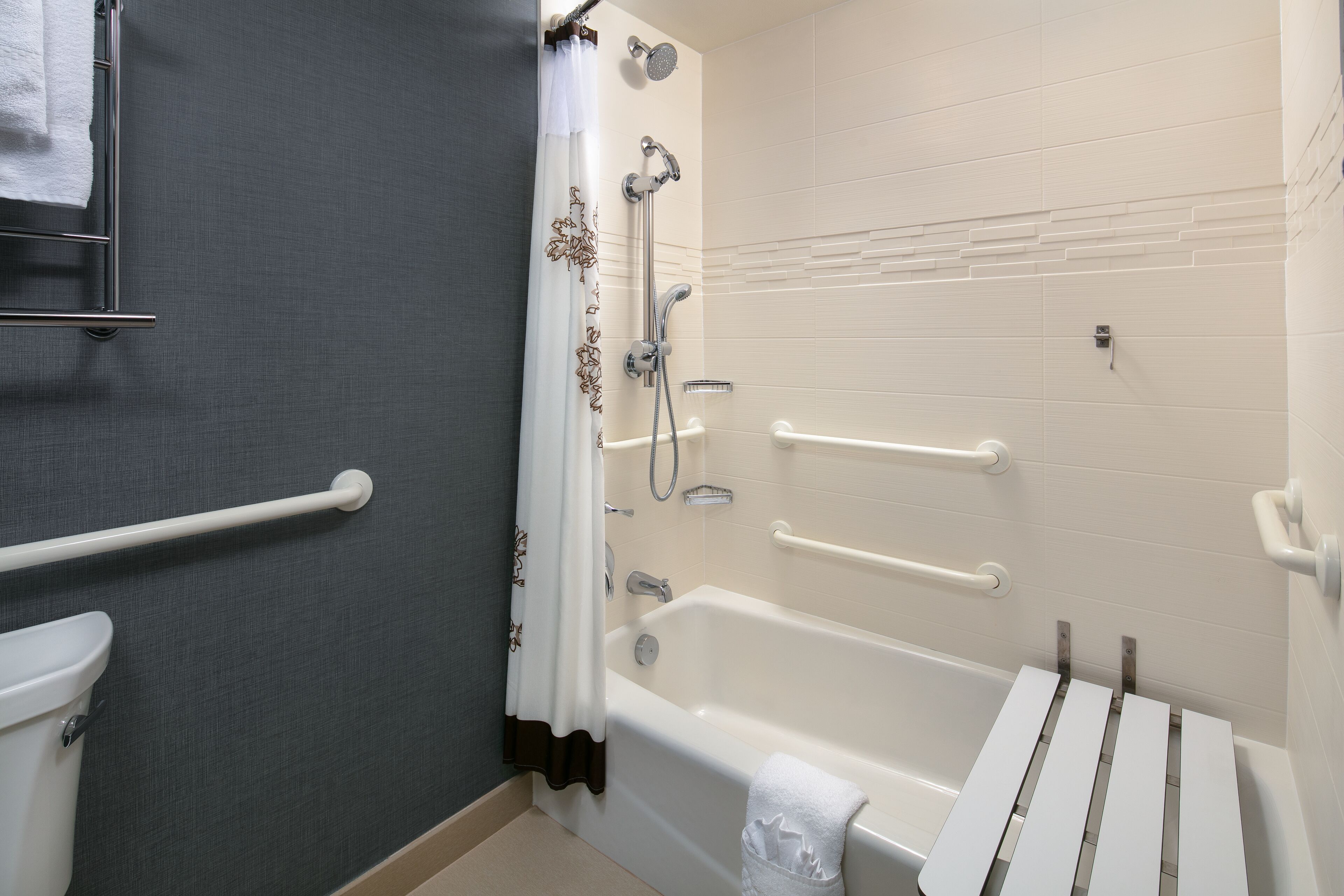 rainfall showerhead, hair dryer, towels