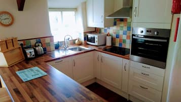 Cottage, salle de bains privée | Cuisine partagée